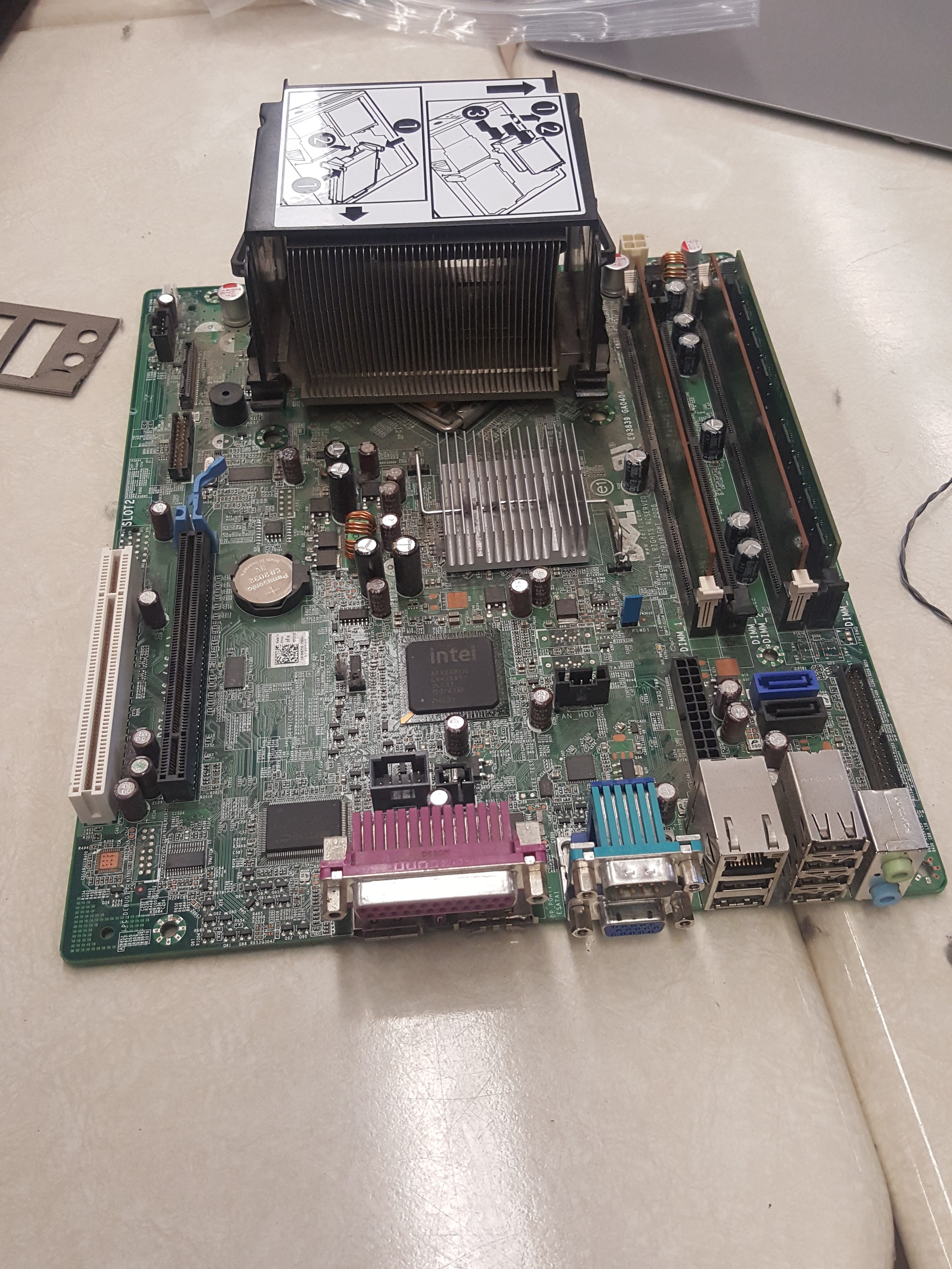 Image of the motherboard from a Dell Optiplex 760 system unit.
